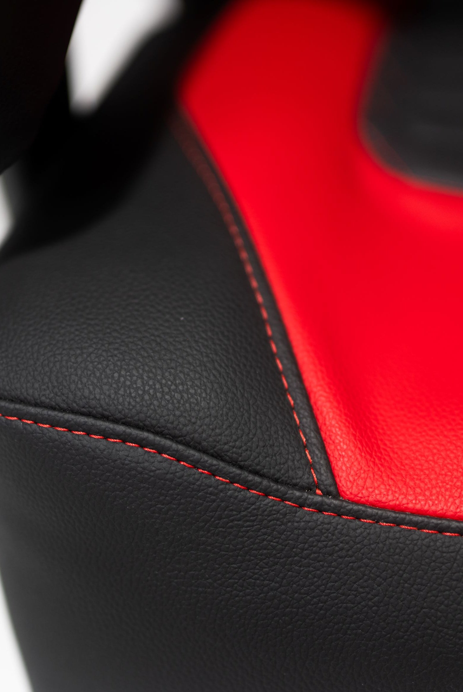 Kratos 4D Throne V2 Corner Cushion showing red stitching and black thermal leather