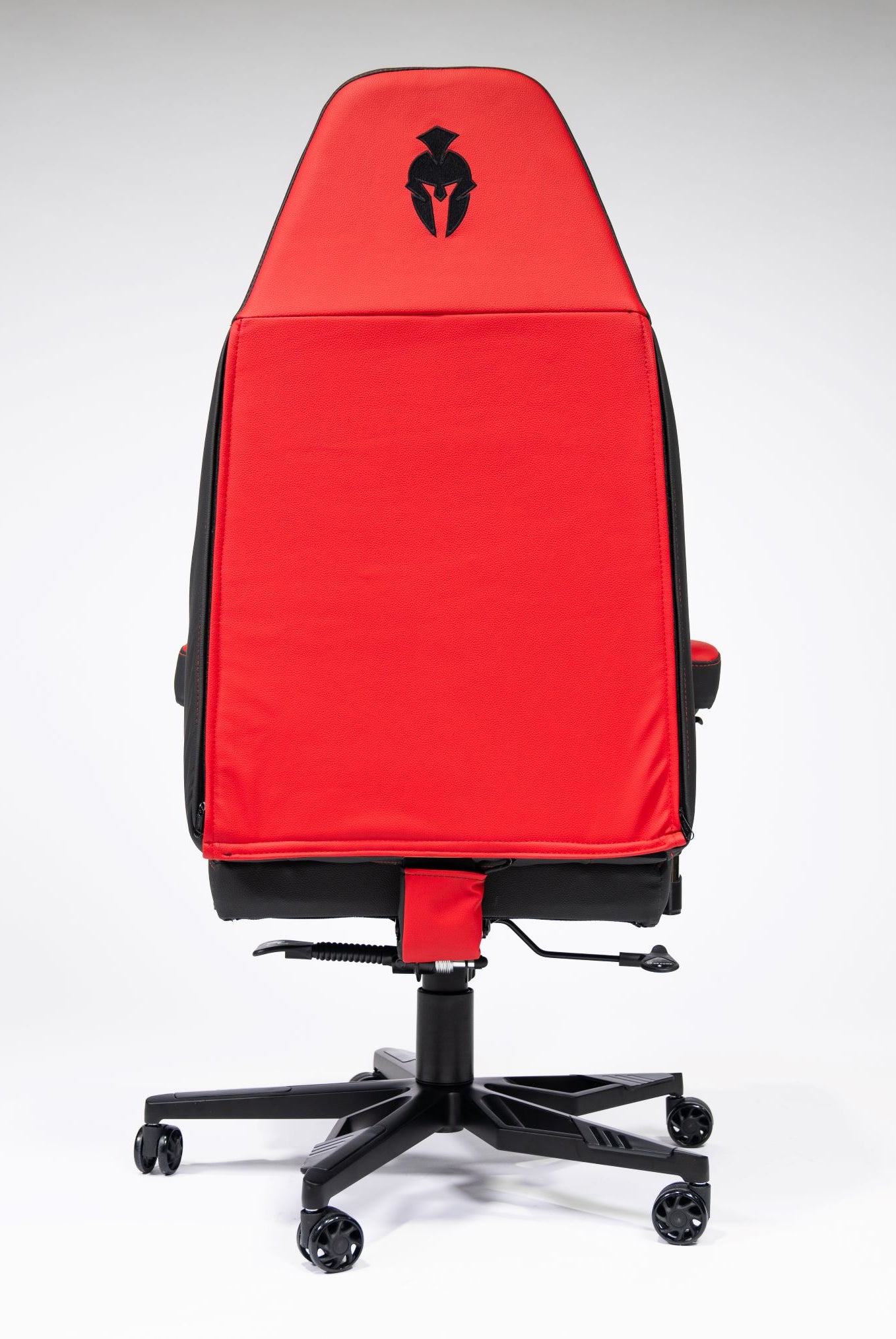 Back side of a red and black gaming chair Kratos 4D THrone