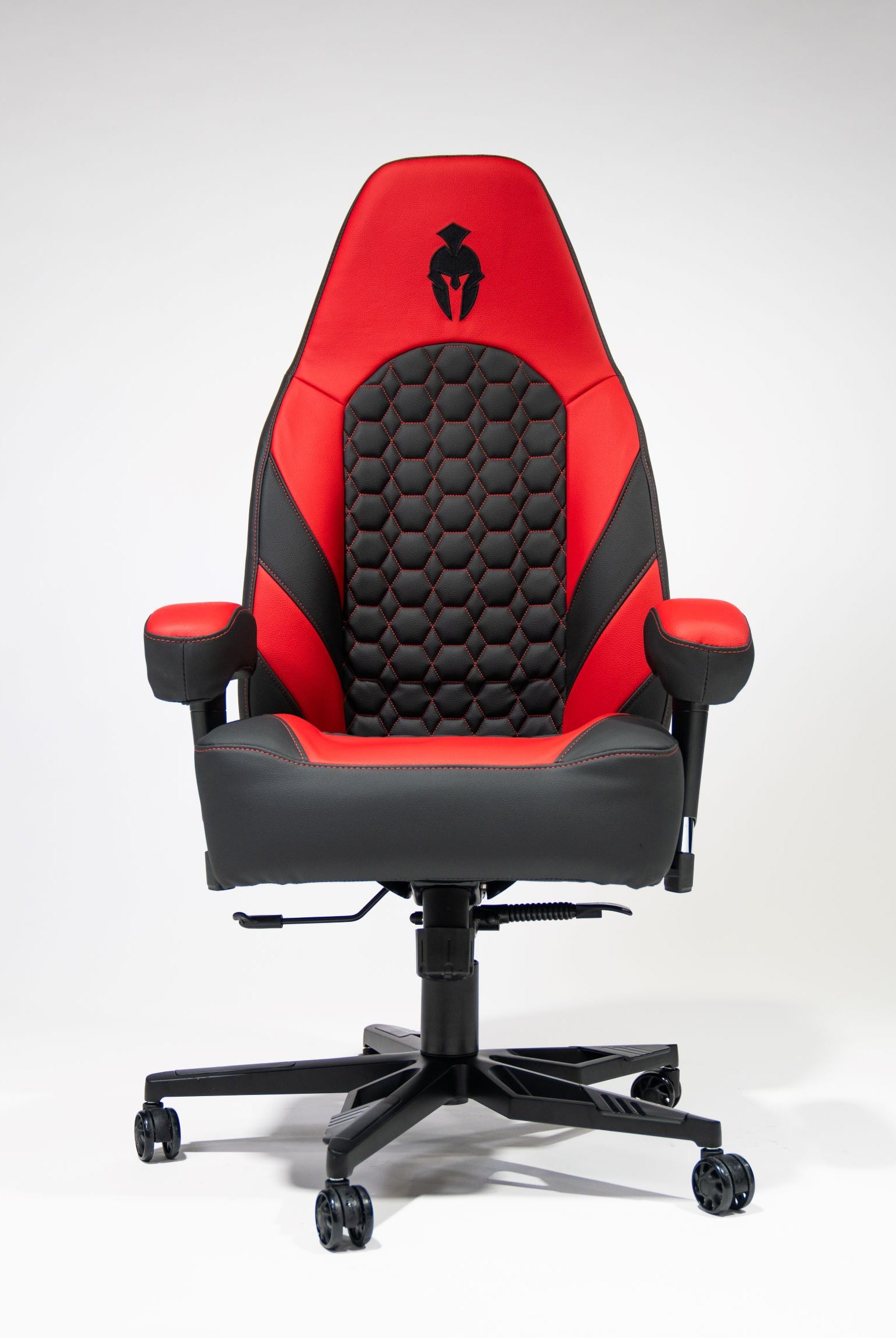 Kratos Pro 4D Throne V2 Red and Black Haptic Gaming chair from the front view on a white background