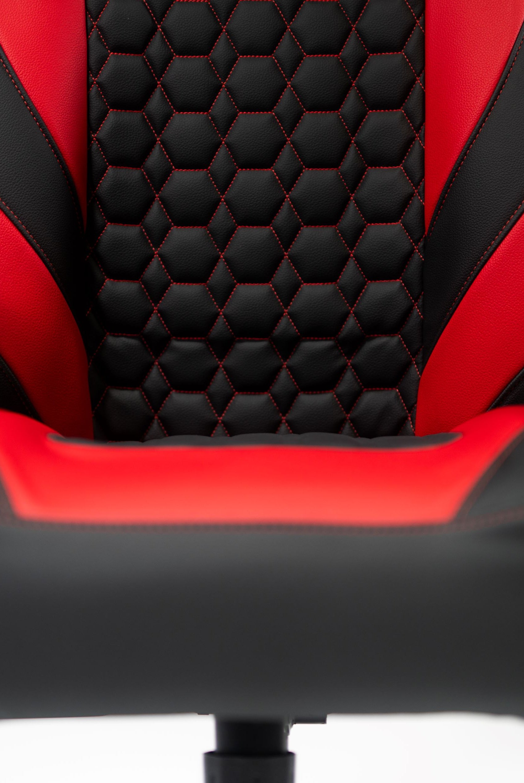 Center view of black and red haptic gaming chair Kratos Pro 4D Throne V2