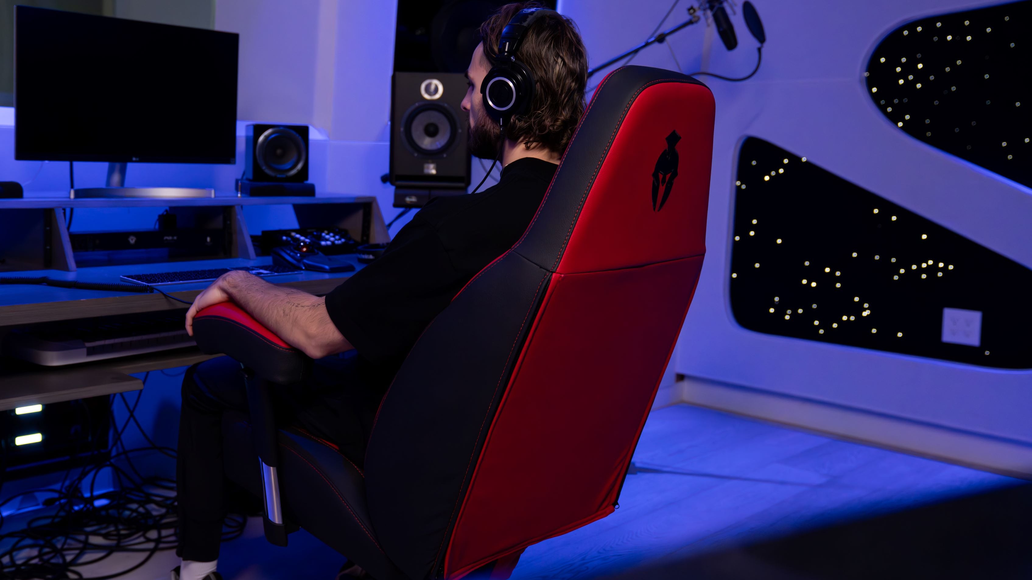 Immersive Haptic Gaming Chair Kratos Pro 4D Throne in a Studio Setting