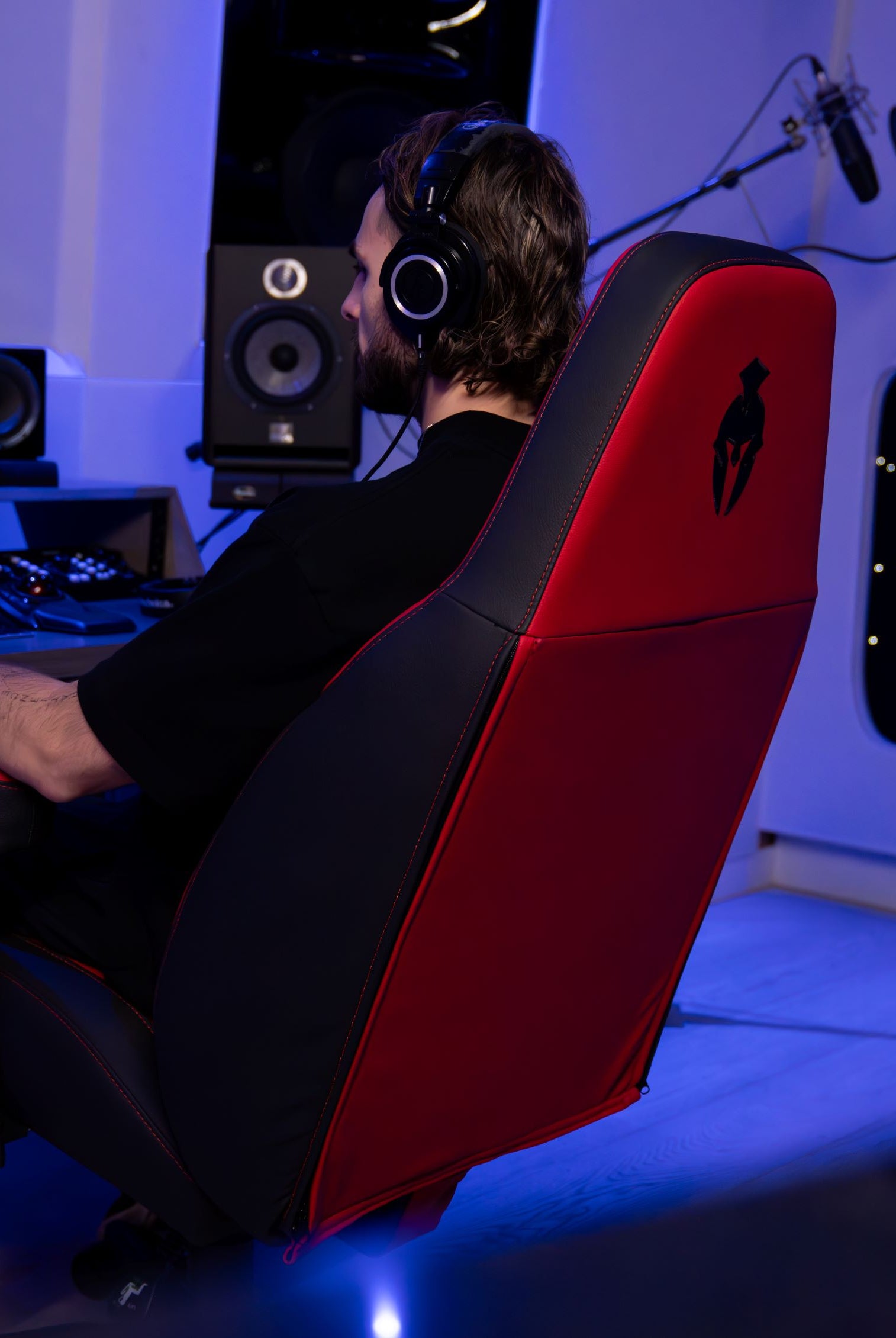 Immersive Haptic Gaming Chair Kratos Pro 4D Throne in a Studio Setting