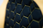 Close up stitching of a yellow and black gaming chair Kratos Pro 4D Throne V2