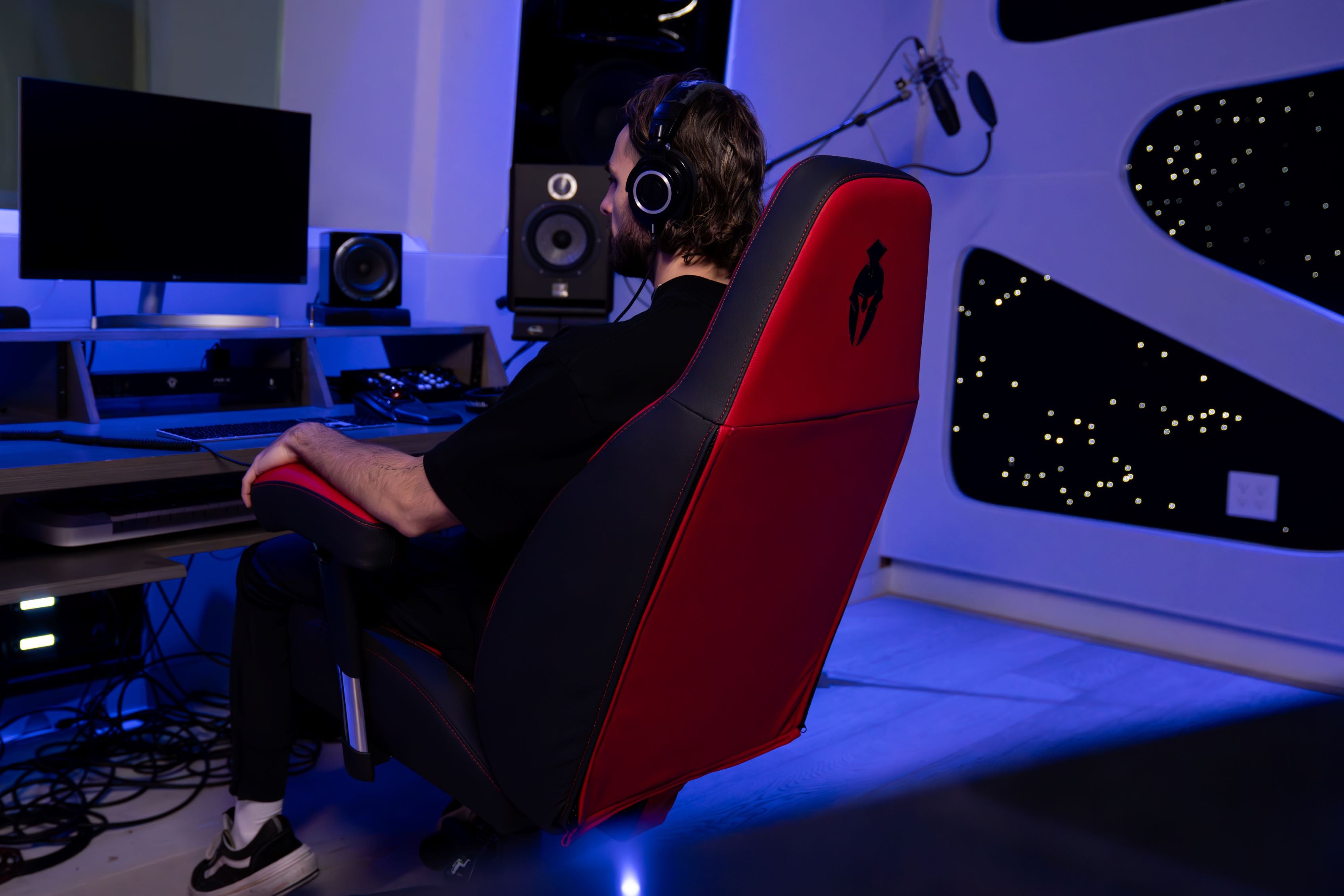Immersive Haptic Gaming Chair Kratos Pro 4D Throne in a Studio Setting